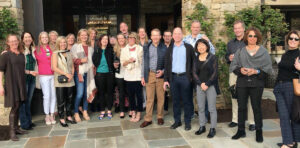 Members of the Class of 1985 in front of a restaurant